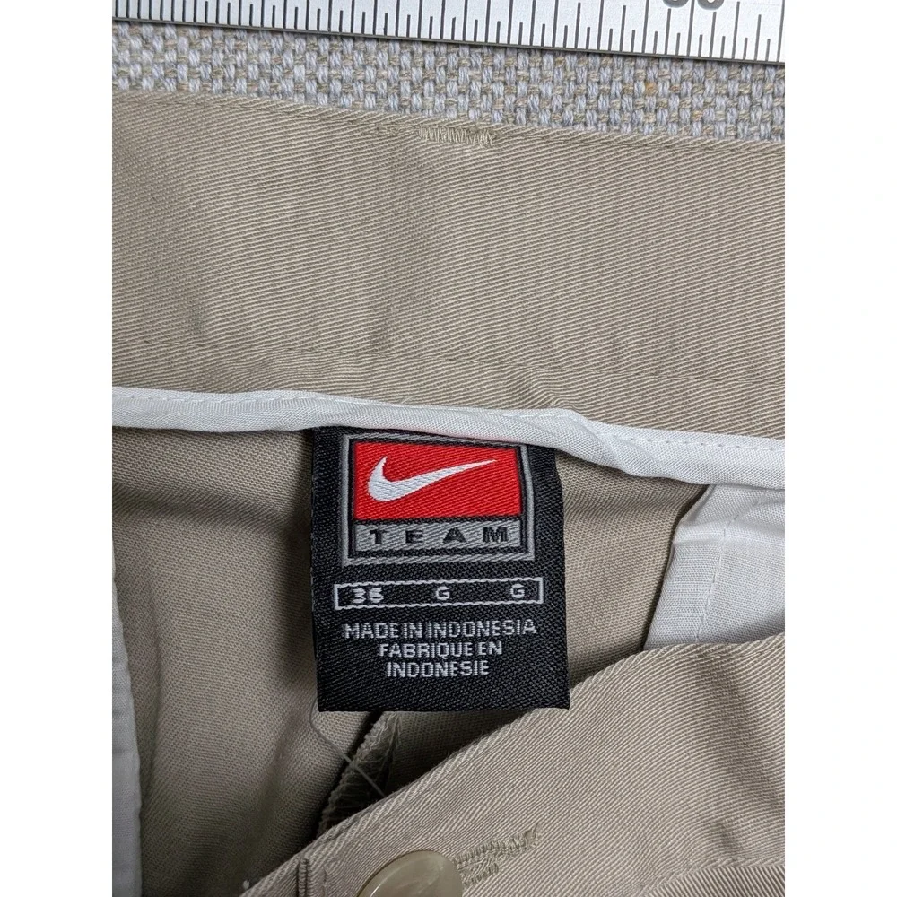 Nike Team Men's Will Chino Pants Tan 36 Cotton Spandex Pleated Unhemmed Golf NWT